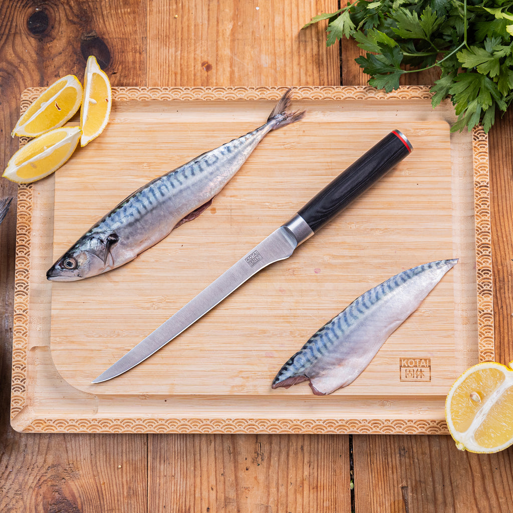 Couteau à filet le poisson Pakka Kotai Réunion, planche à découper
