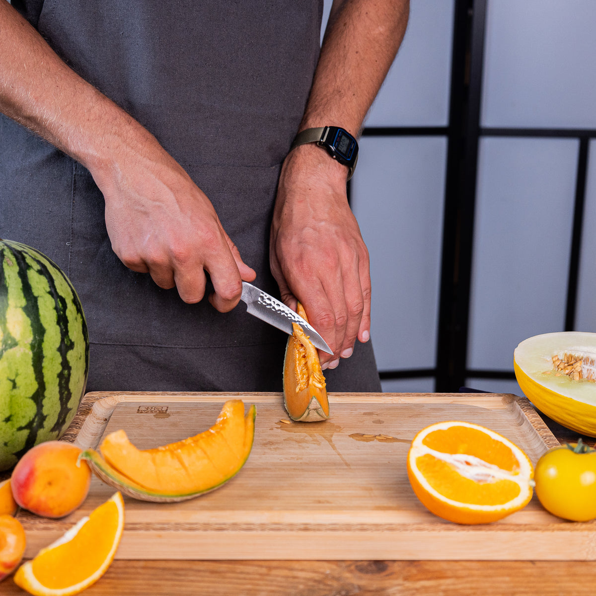 Couteau d'office Pakka Kotai Réunion, découpe melon